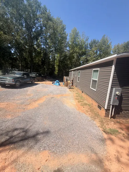 Gravel surface alongside a home