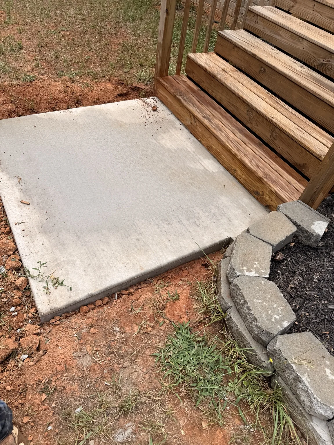 Concrete landing by the steps