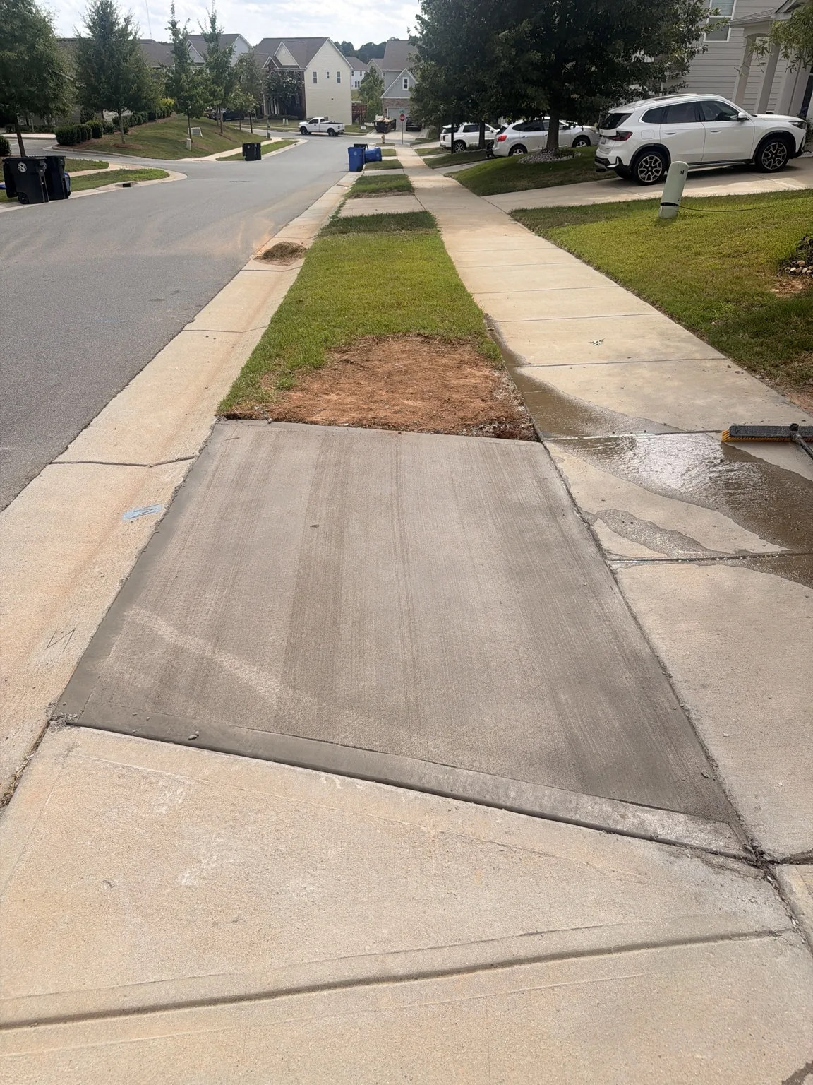 Concrete sidewalk along the street