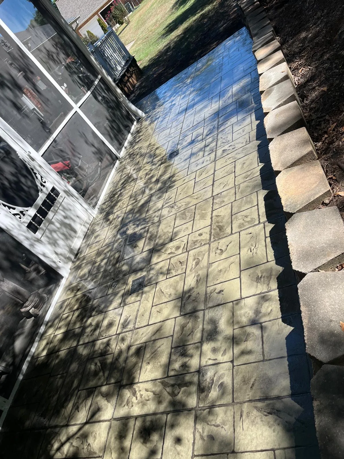 Concrete walkway through the property