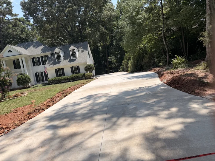Finished residential driveway with clean joints and a broad approach