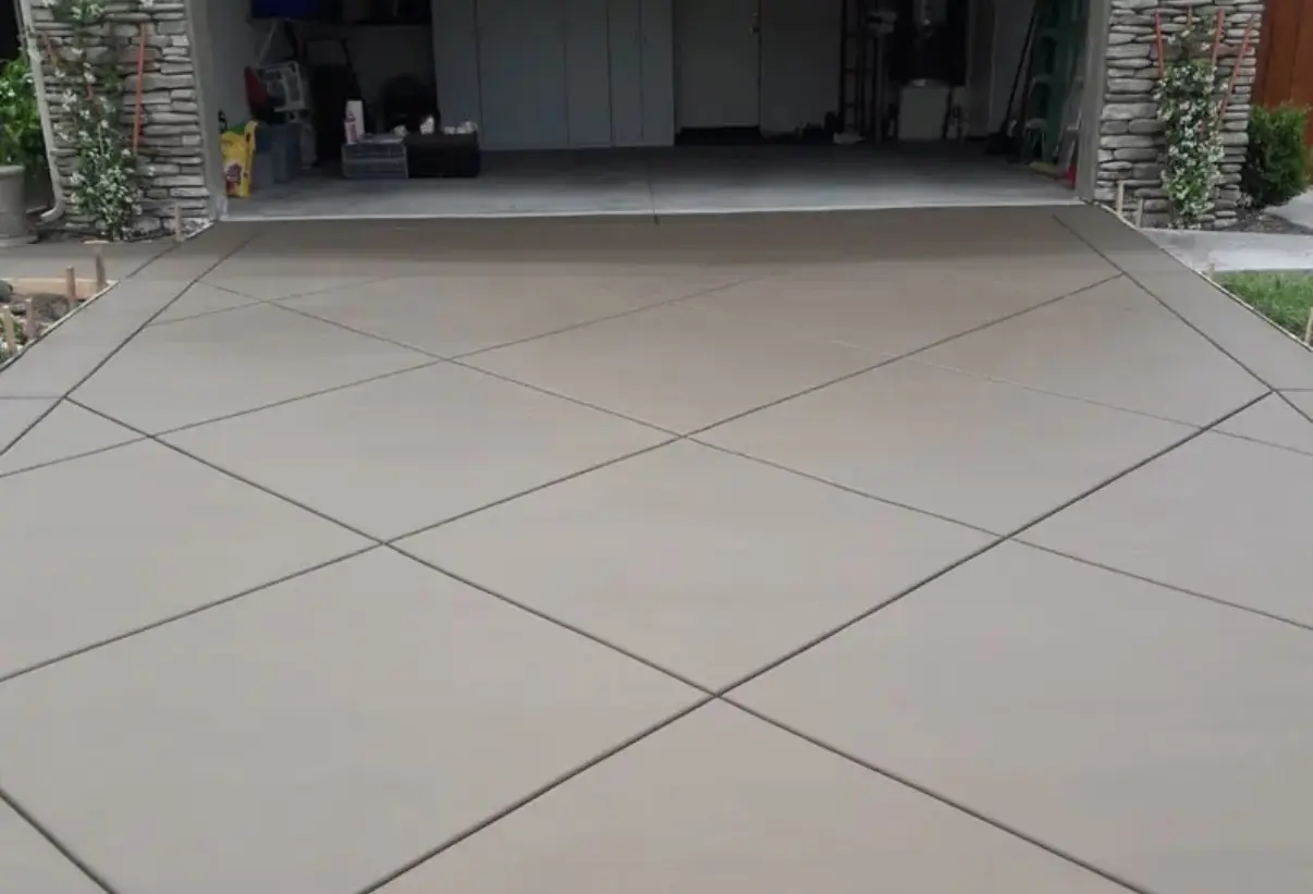 Concrete garage approach with diagonal joints
